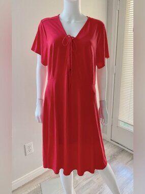 TORRID dress, size 3. Bright. Beautiful red-orange, flared, lace-up, knee-length